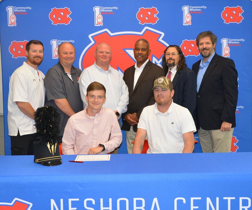 Neshoba Central’s Jimmy Boykin signed with East Central Community College to further his education and be a member of the Wall O’ Sound Band. Pictured, front from left, are Jimmy Boykin and his father Chris Boykin (Back) Assistant Principal Jonathan Walker, Principal Jason Gentry, Assistant Principal Brent Pouncy Assistant Principal LaShon Horne, Band Director Daniel Wade, and ECCC Representative Justin Sharp.